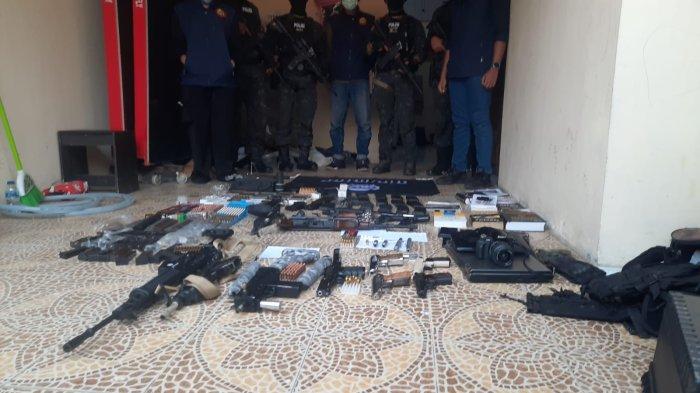 Dozens of factory-made firearms owned by a state-owned enterprise employee, DE, were seized by the Indonesian National Police's Densus 88 Antiterror Unit at his residence in the Harapan Jaya area, Bekasi city, West Java. (Photo: The documentary of Densus 88)