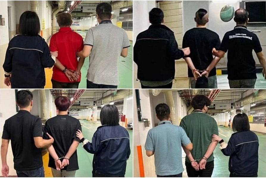 Four arrested in connection with SMS banking phishing scam in Singapore